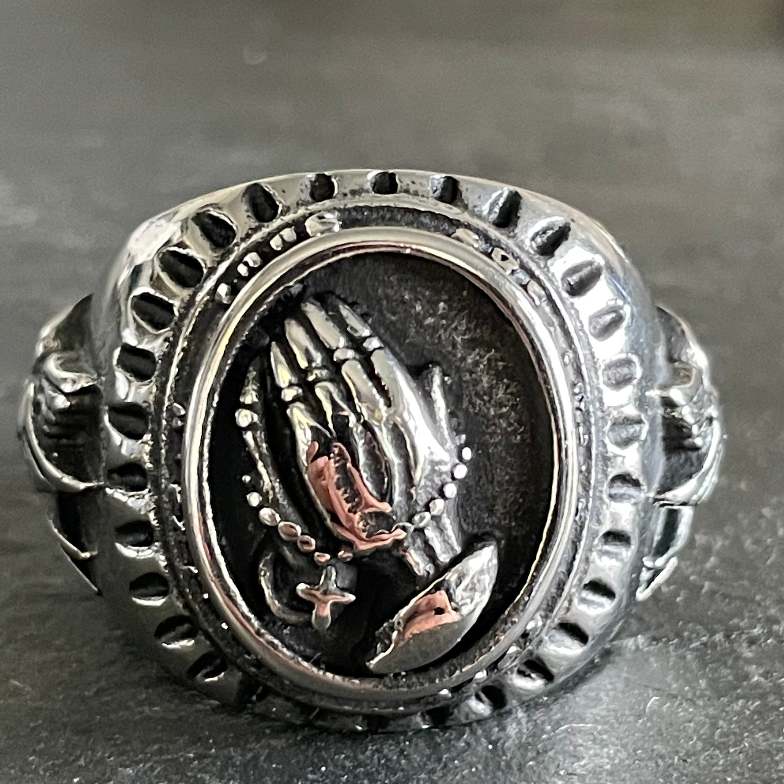 Praying on sale hands ring